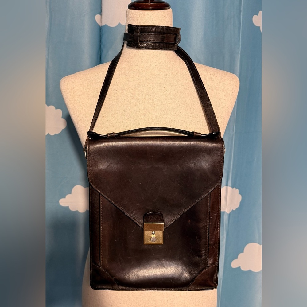 Bally leather crossbody- brass metal hardware. Leather shoulder pad for strap.